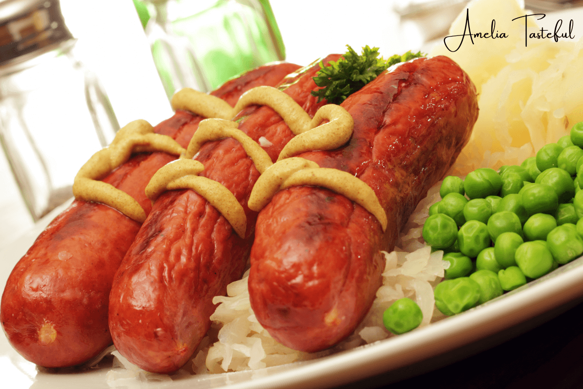 Assorted types of kielbasa on a wooden board