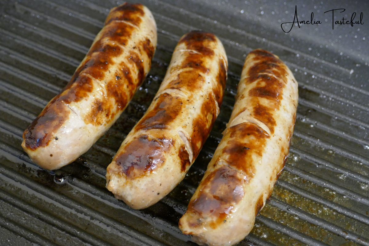 Deliciously cooked kielbasa on a serving board